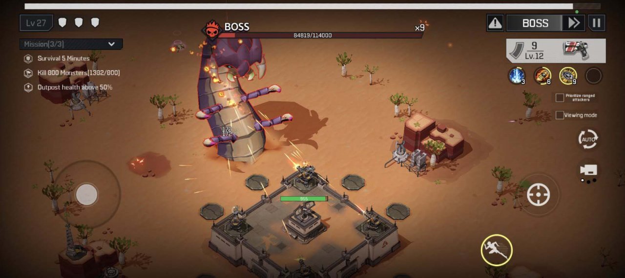 a giant alien worm on a sandy battlefield