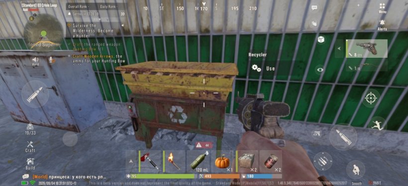 The player approaches a Recycler in Rust Mobile while wielding a revolver
