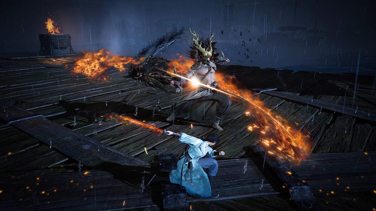 The hero of Where Winds Meet engages in combat with a fiery single blade.