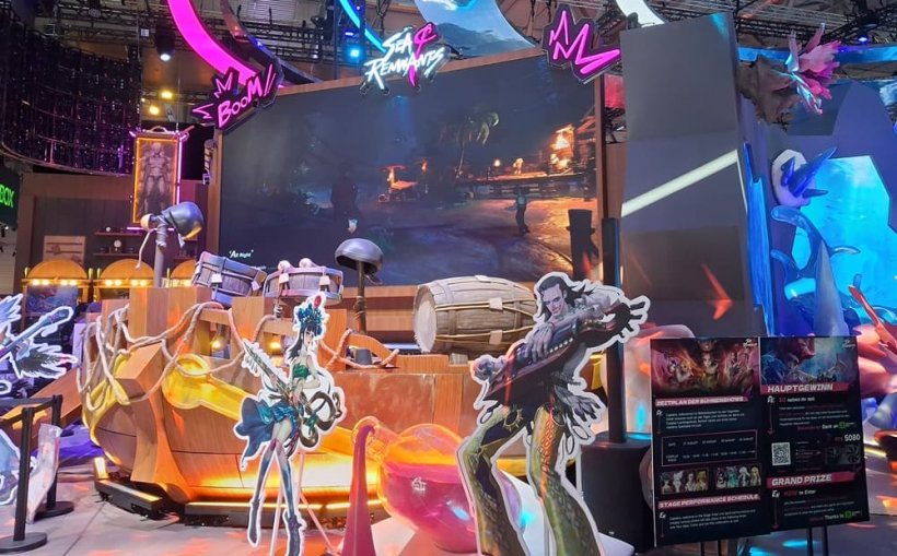 A set of standees depict puppet-like characters within 
