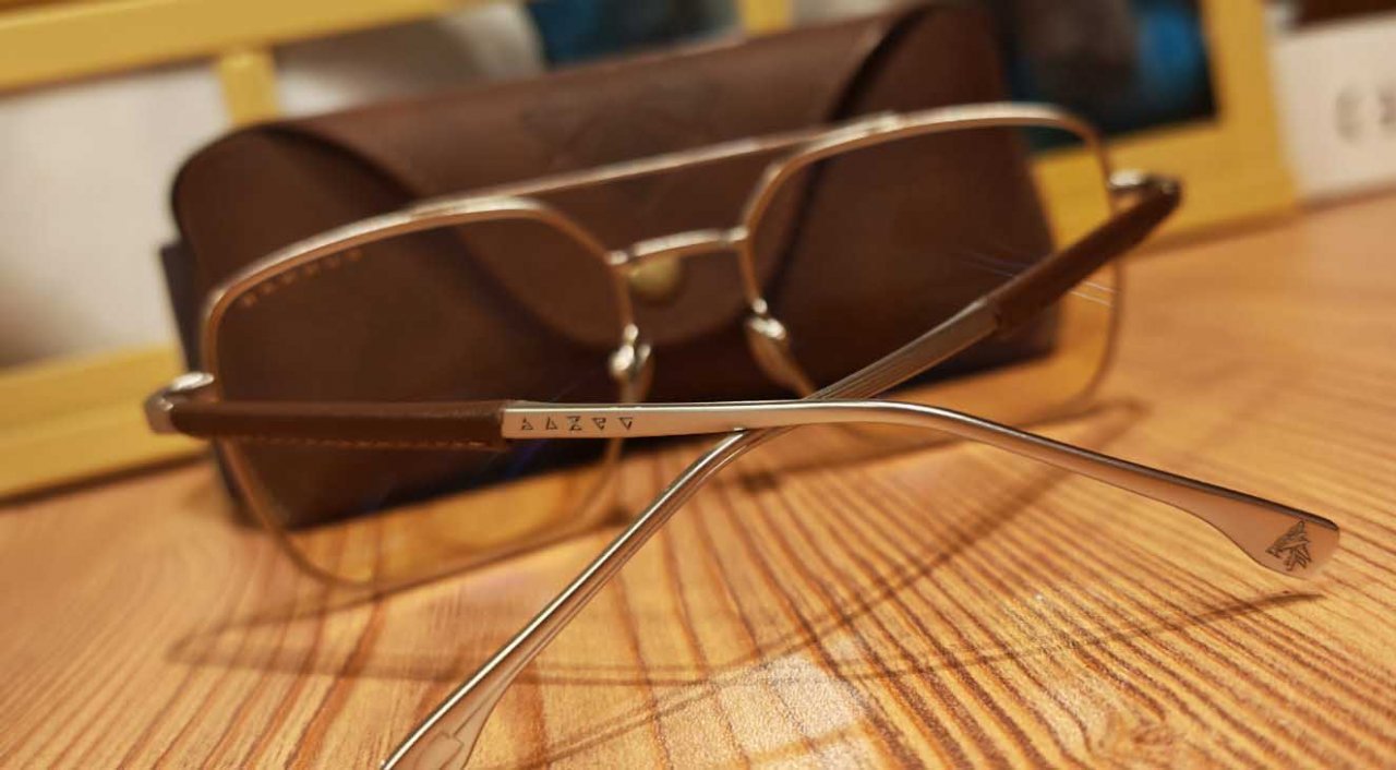 witcher signs etched on the frame of the glasses