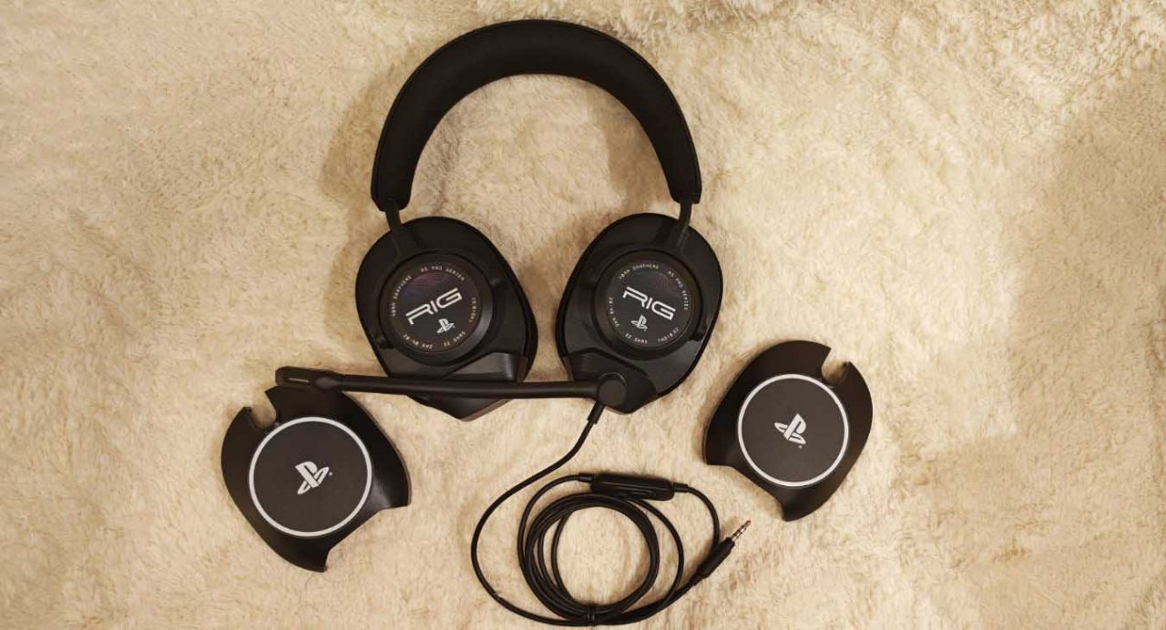 a headset laid out on a surface with mod plates