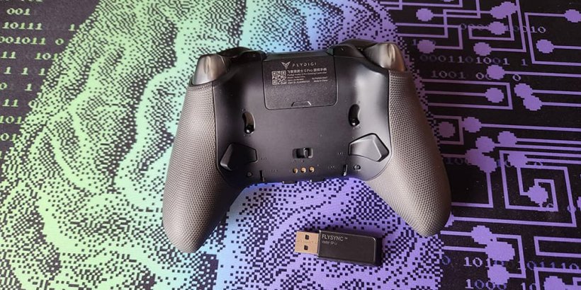 Back view of the Flydigi Vader 5 Pro with dongle beneath it