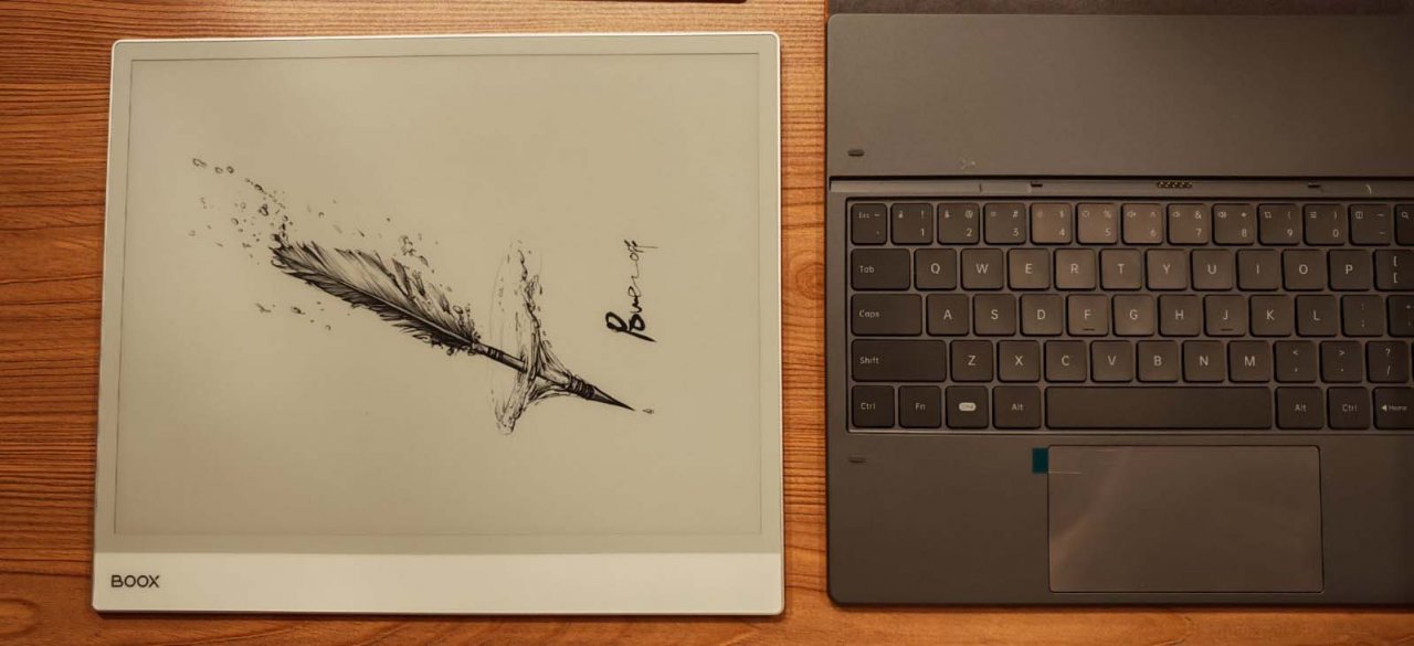 boox note max with the power off screen and its keyboard attachment