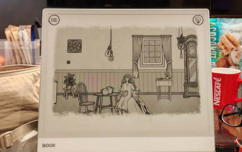 e ink tablet on a table with when the past was around on screen