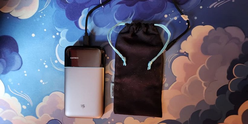 15 Air power bank with cord next to drawstring pouch