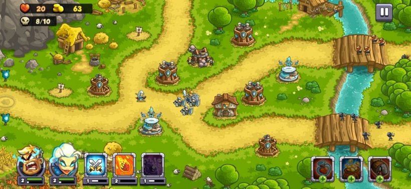 An image of various dirt roads in a colourful cartoon setting, with towers set around them that have defending units stationed, two colourful characters serve as focal points.