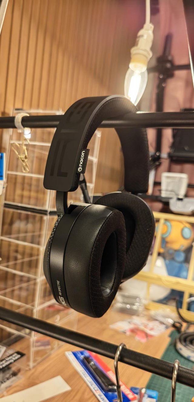 the r8 pro hanging on rails beside a messy work table