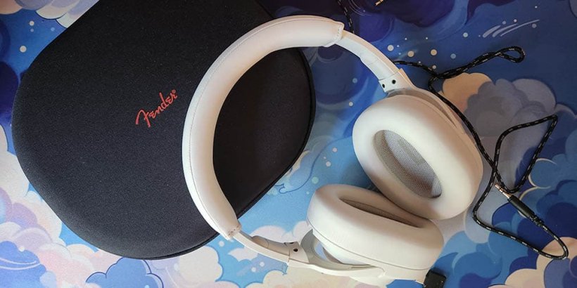 Fender Mix headphones resting on included black zip case