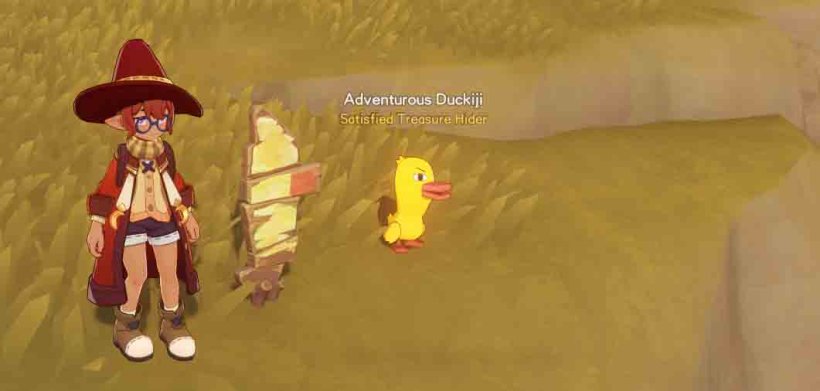 a red-robed witch standing next to an adventurous duckiji