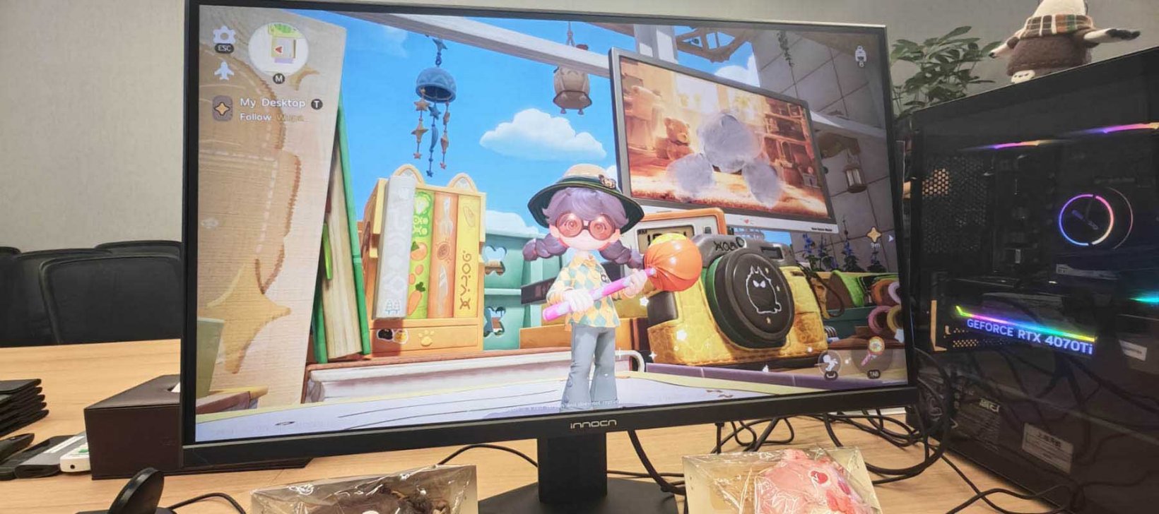 female character standing in front of her computer