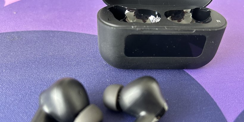 TOZO NC3 Earbuds in the background