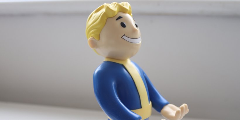 Side view of the Vault Boy Cable Guys phone holder