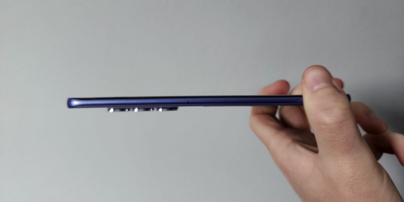 A side view of the Infinix Hot 60 Pro+ demonstrating how thin the phone is