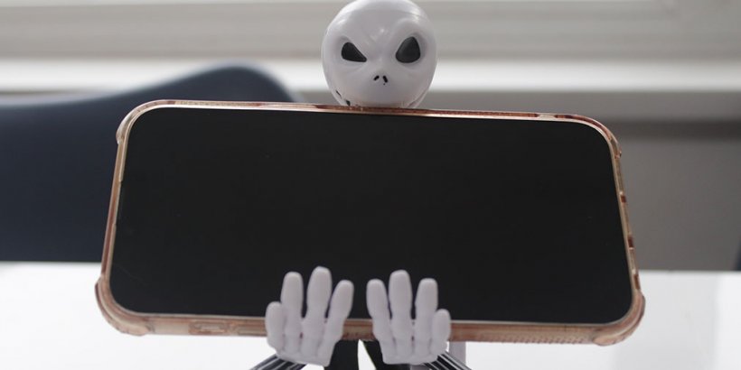 Jack Skellington Cable Guys holding a phone
