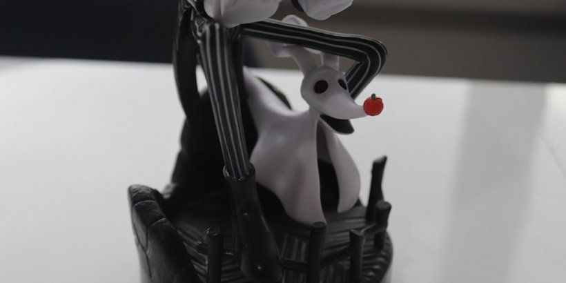 Side view of Zero in the Jack Skellington Cable Guys Phone Holder