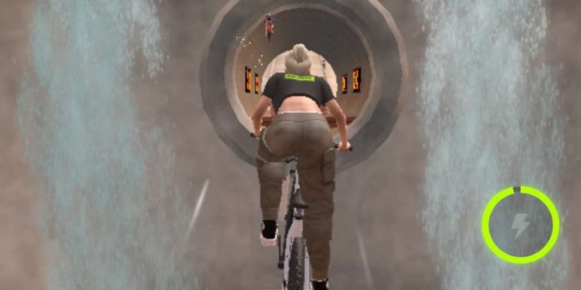 The rider leaps through the air towards a tunnel.