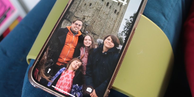 Krafted Couch Charger in Matcha with phone on it