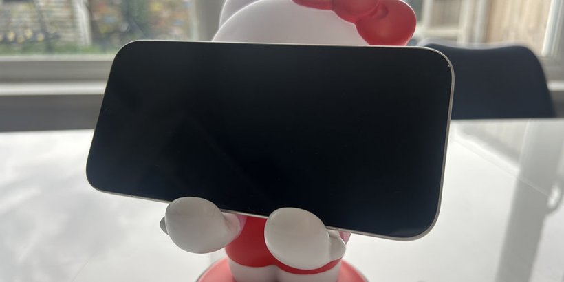 Hello Kitty Cable Guys holding a phone