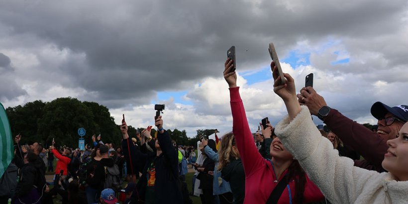 Raising your hands to catch Pokemon at Pokemon Go Fest Copenhagen